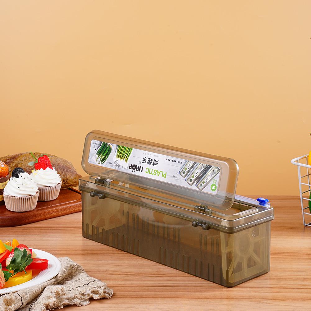 Kitchen Gadgets That Make Life Easier - Dozownik folii spożywczej z nożykiem, organizer